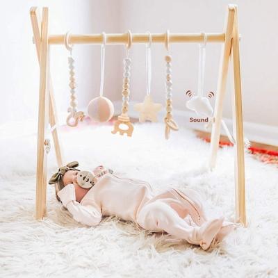 China Universal Wooden Activity Funny Foldable Center Frame Baby Gym Toys 6 Bar Gift Hanging Baby Gym Toys Newborn Baby Play Gym for sale