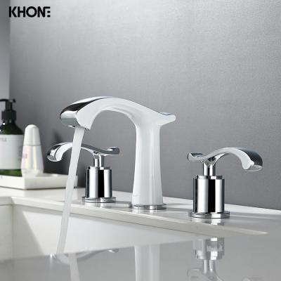 China Japanese Hot Selling Luxury Brass Basin Faucet Bathroom White 3 Holes Pull Down Basin Faucet for sale