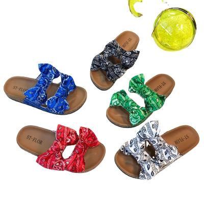 China European and American bow clog flower cashew fashion waterproof flat slippers for women's wear outer slippers for sale