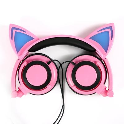 China Good Quality Cute Glowing LED Headband Cat Ears Cell Battery Wired Earphone 3.5mm Stereo Jack Kids Gift Foldable Headphone for sale