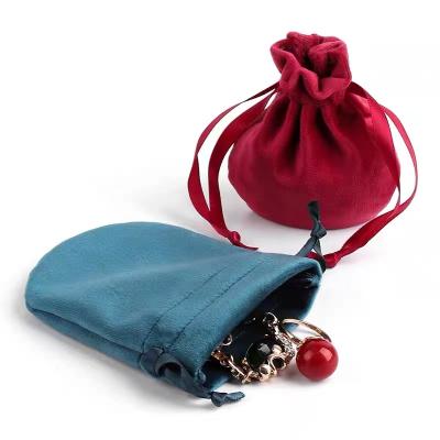 China Round Shape Recyclable Velvet Jewelry Bags Custom Wirh Ribbon for sale