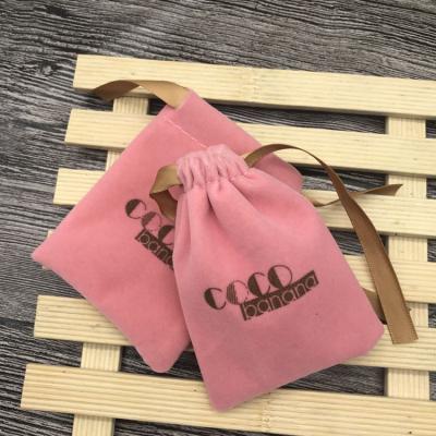 China Disposable Custom Pink Velvet Jewelry Dust Packaging Bag With Gold Printing for sale