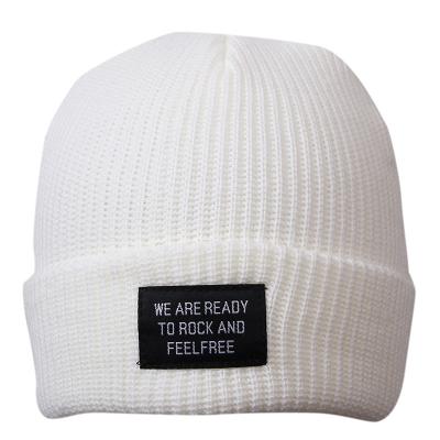 China New Arrival Designer OEM JOINT Logo Woven Label Warm Custom Knitted Winter Beanies Hat With High Quality for sale