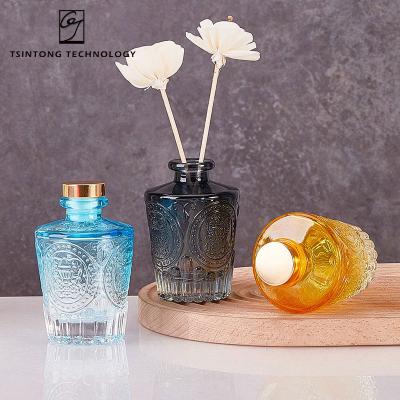 China Simple Factory Luxury Vintage Embossed Small Aromatherapy Scent Scent Reed Diffuser Glass Bottle For Decor And Gift for sale