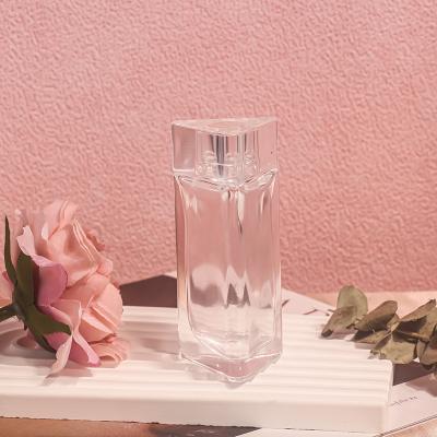 China Luxury Modern Wholesale Luxury Modern Wholesale Empty Transparent Triangle Fragrance Crystal Cosmetics Bottle 30ml Glass Perfume Bottle High Quality for sale