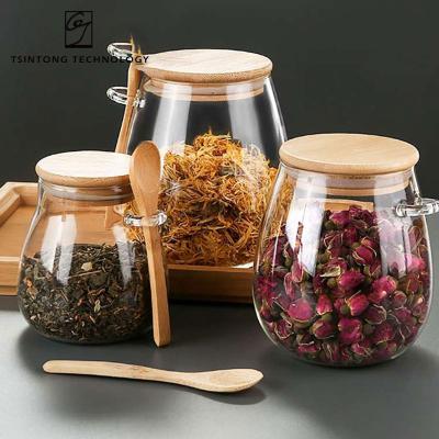 China Transparent Freshness Preservation Round High Borosilicate 600ml 20oz Glass Food Storage Jar Candy Container With Silicon Sealed Bamboo Lid for sale