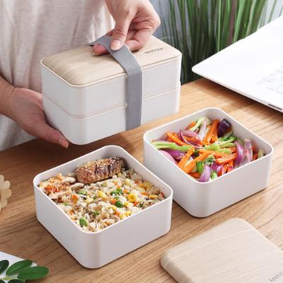 China Sustainable Wooden Grain Square 2 Tier Lunch Box With Spoon And Chopsticks 1400ML for sale