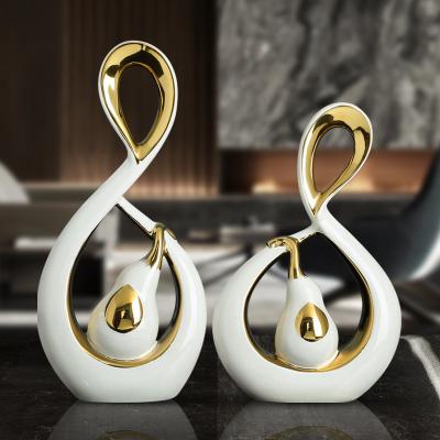 China Nordic Luxury Minimalist Couples Elephant Gold Plated White Porcelain Ornaments Creative Ceramic Home Deco Shape Art Decoration for sale