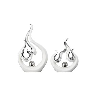 China Hot Sale Unique Home Decoration Accessories Luxury Artistic Style Wine Grade Silver Ceramic Minimalist Flame Modeling for sale