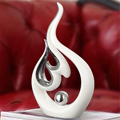 China Hot sale luxury unique modern home decoration art style creative ceramic ceramic minimalist flame modeling living room for sale