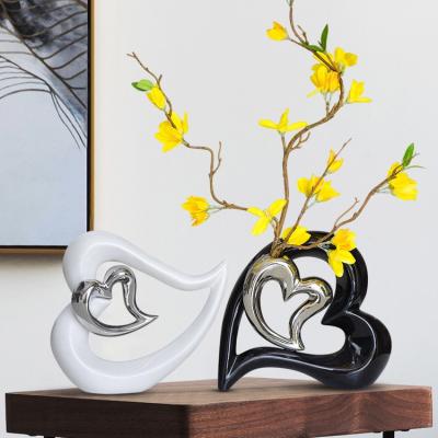 China Nordic Modern Minimalist Creative Heart Shaped Ceramic Flower Vase Crafts Porcelain Flower Container Home Decor for sale