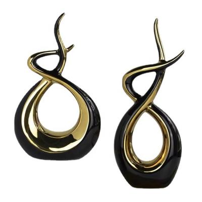 China Unique minimalist hot sale artistic style home decoration accessories the other black home gold plating decor ceramic decor for sale