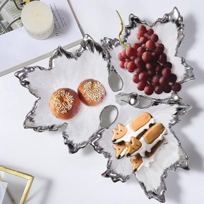 China 7963 Nordic Creative Unique Shape Sustainable Fruit Maple Leaf Ceramic Dish Plated Silver Rim and Snack Tray Large Candy Porcelain Dishes for sale