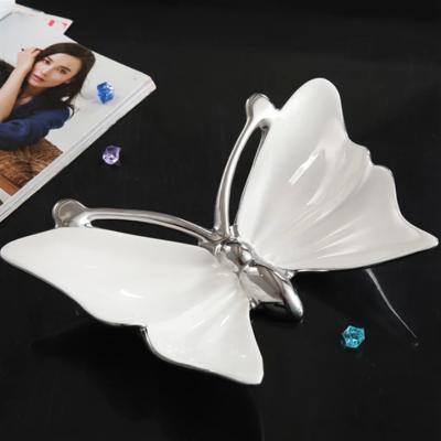 China Simple modern creative unique butterfly shaped 15 inch candy dishes porcelain white fruit ceramic dish and snack tray for party for sale