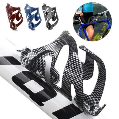 China Road Light Bicycle Carbon Fiber Water Bottle Holder Cage Drink Holder Bicycle Recycling Bottle Holder for sale