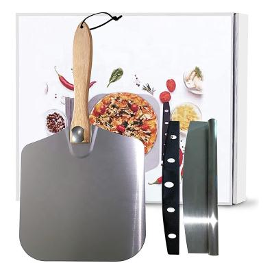 China Hot Selling Amazon Pizza Shovel Cooking Cutting Board Viable Wooden Handle Oven With Aluminum Cutter Pizza Skin for sale