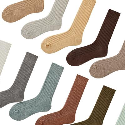 China Autumn and winter cotton men's thick solid color mid-tube socks wholesale sporty needle socks double pi for sale