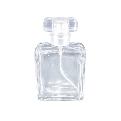 China Cosmetic 30ml 50ml empty clear flat square empty glass bottle new design perfume sprayer bottle for sale