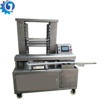 China Automatic snack factory moon cake tray machine pastry tray machine mooncake tray arranging machine for sale