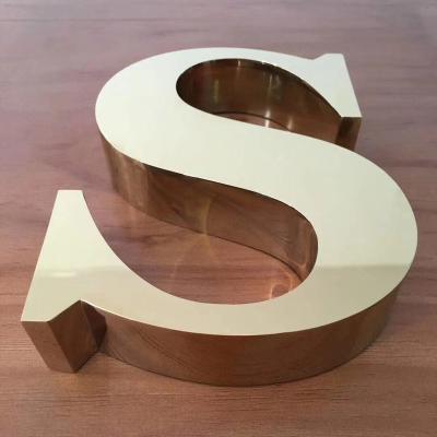 China Simple Custom Stainless Steel Gold 3D Letter Business Signs Waterproof Metal Letters For Building for sale