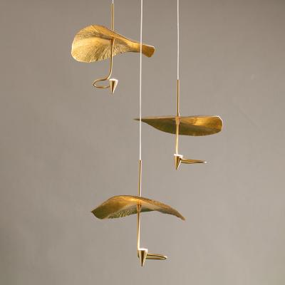 China Surface Mounted Modern Creative Brass Chandelier Lotus Leaf Chandelier Stair Lamp for sale