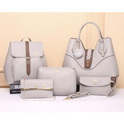 China 2022 gray fashion trend handbag and school bags set 5 in 1 ladies handbag with pom with main hardware for sale