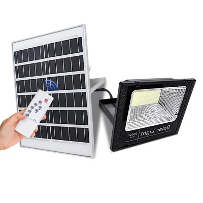 China Garden LED Dusk to Dawn Solar Powered Work Lamp 10W 25W 40W 60W 100W 200W Outdoor Solar LED Flood Light with Remote Control for sale