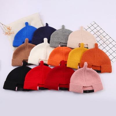 China All-match fashion solid color trend hat warm knitted bowler shape women hand knit beanie for sale