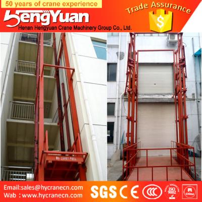 China electric lift cylinder /stationary guide rail goods lift platform for sale