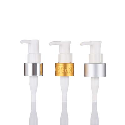 China Non Spill Aluminum Silver Gold 20/410 24/410 28/410 PP Oil Remove Lotion Pump With Clip Lock for sale