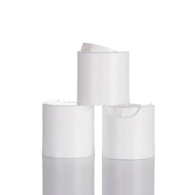 China Non Spill Disc Top Cap 28/410 Plastic Disc Top Cover For Shampoo Lotion Bottle for sale