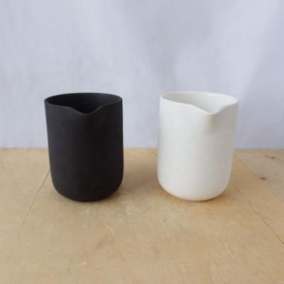 China Eco - Friendly Ceramic Candle Jar With Spout Massage Candle Jar for sale