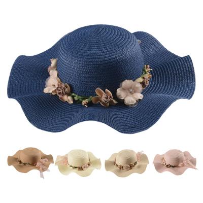 China Wholesale Price Comfortable Flower Decorate Wave Straw Garden Hats Bow Silk Floppy Women's Wtraw Hats for sale