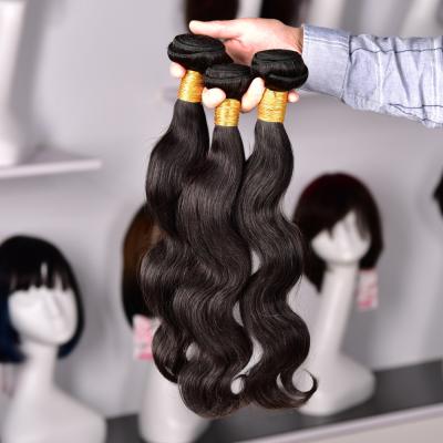 China Human Virgin Hair Brazilian Body Wave Human Hair Bundles Peruvian Hair Extension for sale