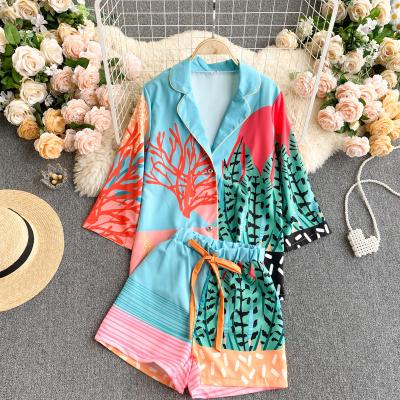 China 2022 New Summer Viable Wholesale Fashion Shorts Sleeve Casual Suit Elastic Waist Printing Wild Holiday Women's Sets for sale