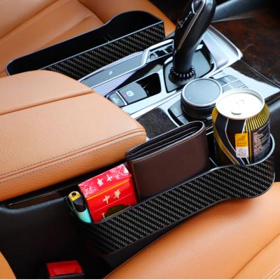 China Plastic Organizer Universal Car Seat Isofrequency Repeater Storage Box Car Cup Holder Storage Box for sale