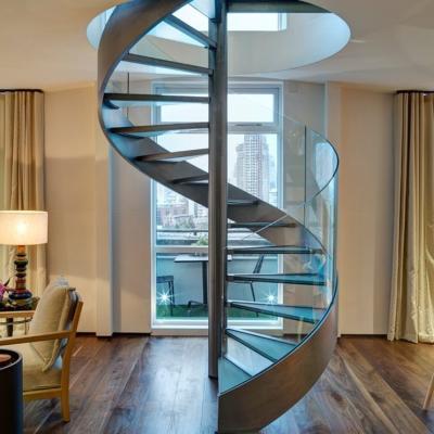 China Modern Hot Sale Spiral Factory Villa Indoor Glass Balustrade Designs Floating Curved Staircase for sale