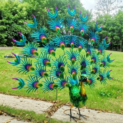 China Contemporary Hot Selling Bright Green Peacock Ornaments Outdoor Home Metal Garden Decoration Ornaments for sale