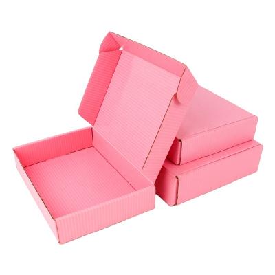 China Handmade Pink Gift Box Corrugated Clothing General Transportation Presentation Box Packaging Paper Backing Customized Size And Printed Logo for sale