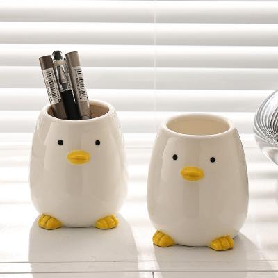 China Europe Storage Racks Racks Special Shape Beige Round Pen Container Fancy Ceramic Pen Holder For Office for sale