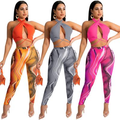 China EB-2022051902 QUICK DRY Beach Halter Neck Women 2pcs Sets Twist Crop Tops And Tie Dye Legging Pants 2 Piece Sets Women's 2 Piece Outfits for sale