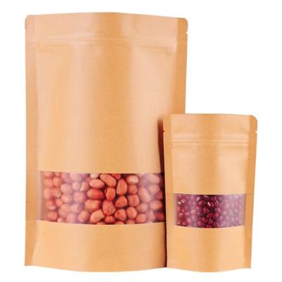 China Moisture Proof Food Stand Up Pouch Kraft Paper Packaging Bag With Clear Window for sale