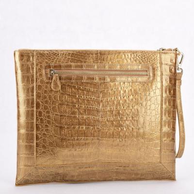 China Luxury Newest Clutch Bag Crocodile Clutch Bags With Wrist Strap Gold Oversized Leather Handbags for sale