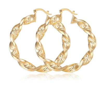 China Fashion 18K Nickel Free Simple Clip On Twisted Circle Earrings Women Brass Jewelry for sale