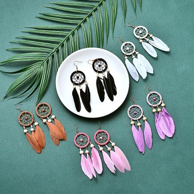 China Dreamy Bohemian Style Fashion Feather Long Feather Catcher Earrings Women's Earrings for sale