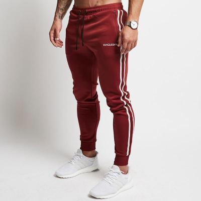 China Factory Price Anti-pilling Patchwork Side Stripe Streetwear Men Hop Joggers Sports Tracksuit With Pocket for sale