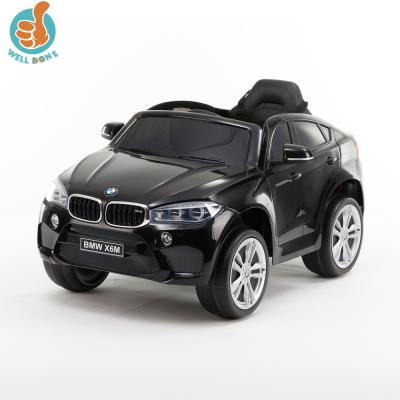 China LED Headlights And Music Licensed BMW X6M 1 Seat 12v Electric Baby Remote Control Car for sale