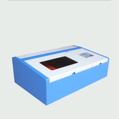 China co2 laser cutting machine 3020 portable mini laser 3020 laser engraving machine for sale