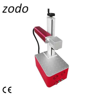 China 20,30W,50W desktop type metal fiber laser marking machine for sale