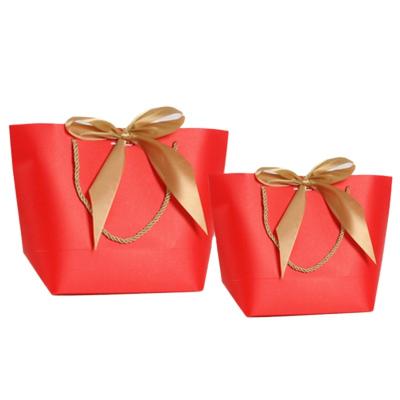 China New Recycled Materials Listing Customizable Designed Recycled Materials Large Gold Gift Bag With Handle ODM for sale